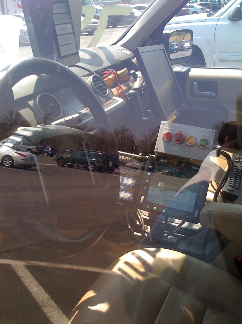 Illustration for article titled DARPA Urban Challenge Cars Invading Pentagon Parking Lot